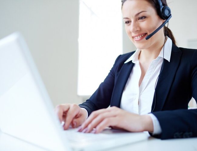 businesswoman-using-headset-laptop_1098-3110